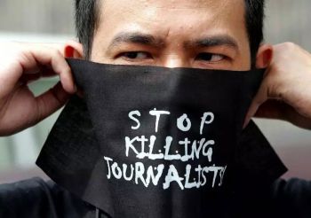 stop killing journalists protestor