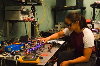 Summer Student Poppy Joshi working with the blue laser