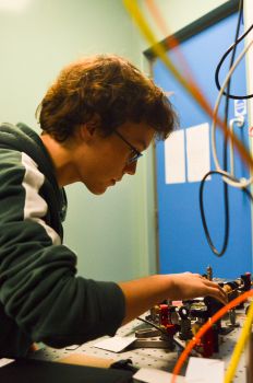 A-Level student Kai Osborne working in the quantum laboratories