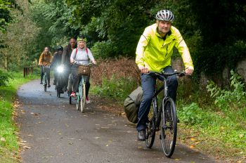 The group cycles onto campus