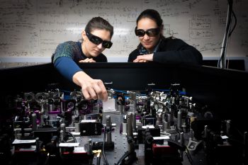 Julia and Poppy checking their lasers