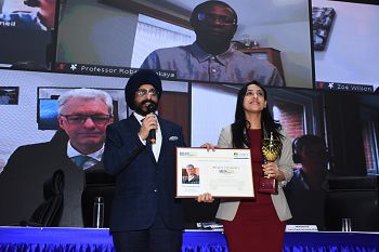 Radhika Arora receiving the Global Academic Excellence award conferred upon Professor Sasha Roseneil