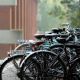 An image of a row of bikes on the University of Sussex Campus