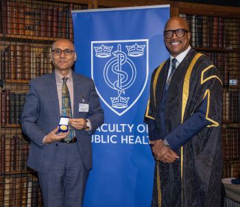 Professor Anjum Memon receiving his award at the annual FPH Awards Ceremony