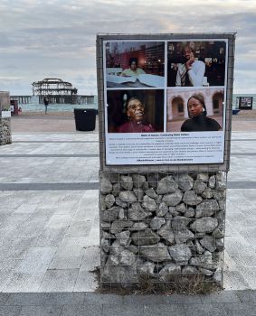 Black at Sussex - Portraits panel at display on Brighton seafront