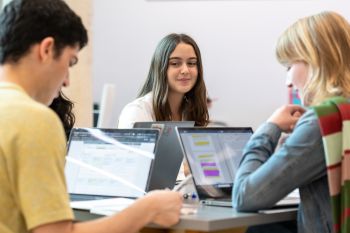 Students studying on laptops