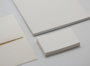 Photogrpah of plain white paper and business cards