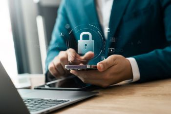 The image shows an illustration of a padlock above a phone and laptop.