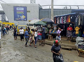2025_MichaelFadeyi_DeafWomansShop_PermissionGiven View of a deaf woman’s shop and other shops selling their items in Nigeria